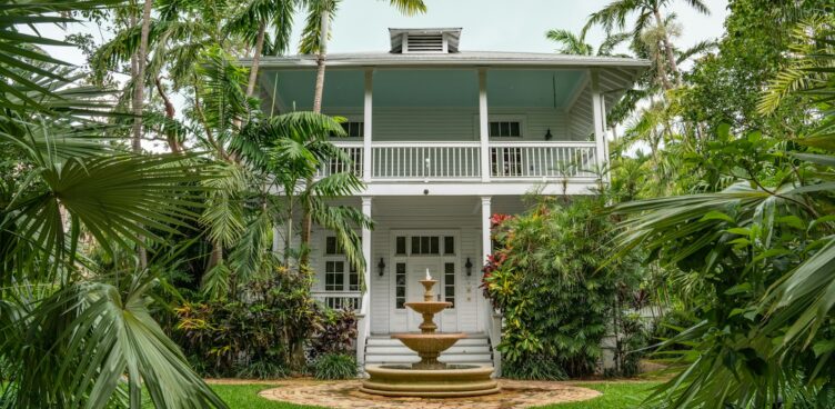 white house with outdoor fountain